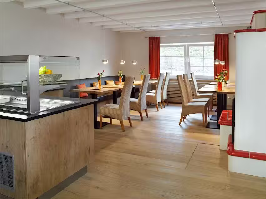 &bdquo;Kaminzimmer&ldquo; Restaurant in Merker&acute;s Bostalhotel