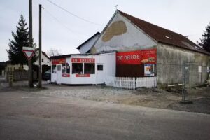 Tat Deluxe