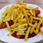 Wolf Fleischerei-Fachgesch&auml;ft mit Heisser Wolf Restaurant